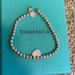 please return to tiffany and co silver bracelet